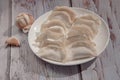 chinese dumplings on wooden table background