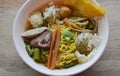 Chinese egg noodle with fish ball and crispy squid in soup Royalty Free Stock Photo