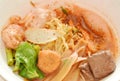 Chinese egg noodles with shrimp and fish ball in red soup Chinese-language called Yong Tau Fu Royalty Free Stock Photo