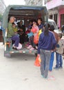 Chinese families in a retro tuk tuk,Xingping,China