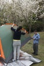 Family pitch a tent