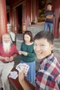 Chinese Family Playing Card In Jing Shan Park Royalty Free Stock Photo