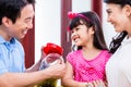 Chinese family saving money for college fund Royalty Free Stock Photo