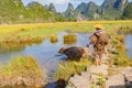 Chinese farmer with water buffalo, China. Royalty Free Stock Photo