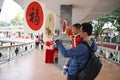 A Chinese father is sharing the joy of the Chinese New Year with his son