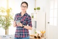 Chinese female architect hold a cup of coffee
