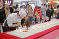 Chinese female chef made super long cream cake, adobe rgb