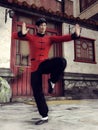 Chinese fighter in black and red clothes