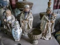 Chinese figures in an antique shop