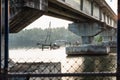 Chinese fisher net under a bridge along the kollam kottapuram waterway Royalty Free Stock Photo