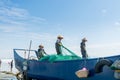Chinese fishermen pulling the fishnet at the sea in Xitou Yangjiang, Guangdong, China