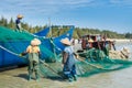 Chinese fishermen pulling the fishnet at the sea in Xitou Yangjiang, Guangdong, China