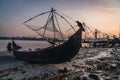 Chinese fishing nets during the Golden Hours at Fort Kochi, Kerala, India sunrise bird Royalty Free Stock Photo