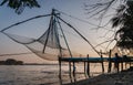 Chinese fishing nets during the Golden Hours at Fort Kochi, Kerala, India sunrise fisherman work Royalty Free Stock Photo