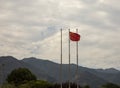 Chinese flag at Emperor Qin Shi Huang Di burial mound, Xian, Chi