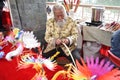 A Chinese folk artist is making dolls with rattan
