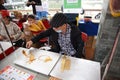 Chinese folk craftsman who is making sugar paintings