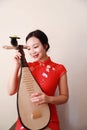 Chinese folk music performer playing Pipa Royalty Free Stock Photo