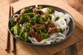 Chinese food - beef prepared with broccoli and rice noodles. Royalty Free Stock Photo