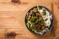 Chinese food - beef prepared with broccoli and rice noodles. Royalty Free Stock Photo