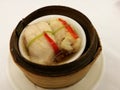 Chinese food in China town, steam fish in soy sauce on bamboo basket, dimsum bamboo tray in the local traditional Chinese restaura Royalty Free Stock Photo