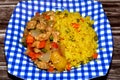 A Chinese food cuisine meal of spicy Chicken mushroom with soy sauce and vegetables and Hot steamed long grain yellow Basmati rice Royalty Free Stock Photo