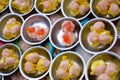 Chinese food dim sum on self service busket tray background.