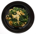 Chinese food. Fried spinach with eggs Royalty Free Stock Photo