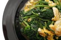 Chinese food. Fried spinach with eggs Royalty Free Stock Photo