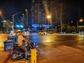 Chinese food guys riding motorcycles in the street wuhan city