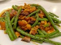 Chinese Food long bean with mushroom cooked with oyster sauce on white plate, oriental Stir Fry Food