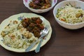 Chinese food served on plate. delicious and tempting fried rice and chilli chicken. famous in indian restaurants. close up shot