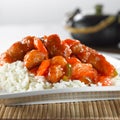 Chinese food - sweet and sour chicken on rice Royalty Free Stock Photo