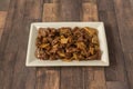 A Chinese food tray of chopped beef with bamboo and stewed mushrooms and oyster sauce Royalty Free Stock Photo