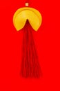 Chinese fortune cookie and tassel on red background Royalty Free Stock Photo