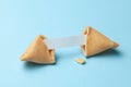 Chinese fortune cookies. Cookies with empty blank inside for prediction words. Blue background Royalty Free Stock Photo