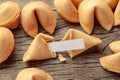 Chinese fortune cookies. Cookies pile with blank blank inside for words prediction. Background of old wooden table Royalty Free Stock Photo