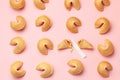 Chinese fortune cookies. Cookies texture pattern with empty blank inside for word prediction. Pink background Royalty Free Stock Photo