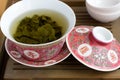 A chinese gaiwan with tea on a tea table Royalty Free Stock Photo