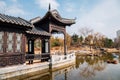 Chinese garden, pond and traditional pavilion in autumn Royalty Free Stock Photo