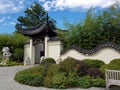 Chinese garden with traditional walls and gate Royalty Free Stock Photo