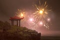 Chinese gazebo building on the park with fireworks Royalty Free Stock Photo