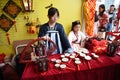 Chinese girl dressed in cosplay costume selling crafts at the Chinese new year market