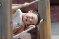 Chinese girl playing on a bridge Royalty Free Stock Photo