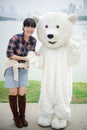 Chinese girl and polar bear mascot