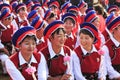 Chinese girl in traditional Bai clothing during the Heqing Qifeng Pear Flower festival