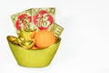 Chinese gold ingots decoration isolated on white background. Royalty Free Stock Photo