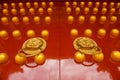 CHINESE GOLDEN LION ON RED DOOR Royalty Free Stock Photo