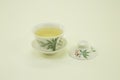 Chinese green tea. Milk Oolong Tea. Green tea in a beautiful traditional oriental cup with saucer. Isolated on a white background Royalty Free Stock Photo