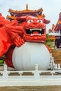 A Chinese Guardian Lion with the ball can be seen at the main en
